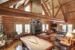 Bear Butte Gulch Lodge living room with pool table. 